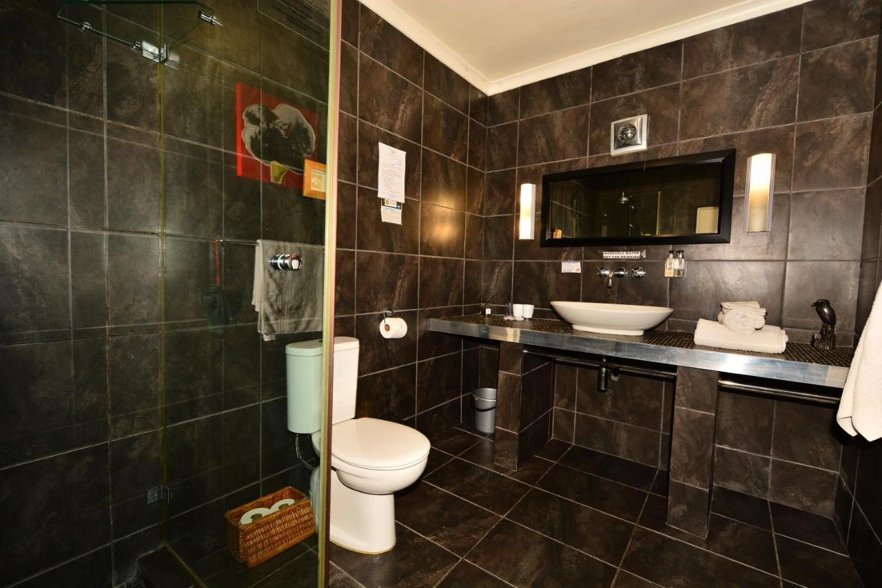 Secret Garden Guesthouse Bloubergstrand Bagian luar foto